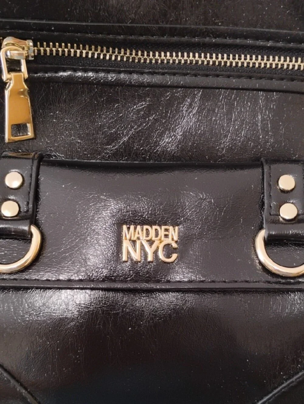 Steve Madden Black Faux Leather Mini Backpack with Gold Hardware